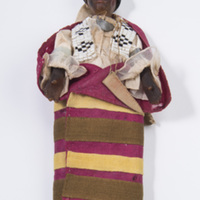 Male Doll with Wampum Belt and Silver Brooch