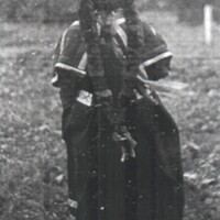 Dress and sleeves modeled by unknown woman at White Earth, 1917