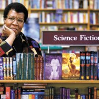 Octavia Butler poses for a photograph near some of her novels at University Book Store in Seattle, Wash., on Feb. 4, 2004<br />
JOSHUA TRUJILLO—SEATTLE POST-INTELLIGENCER/AP
